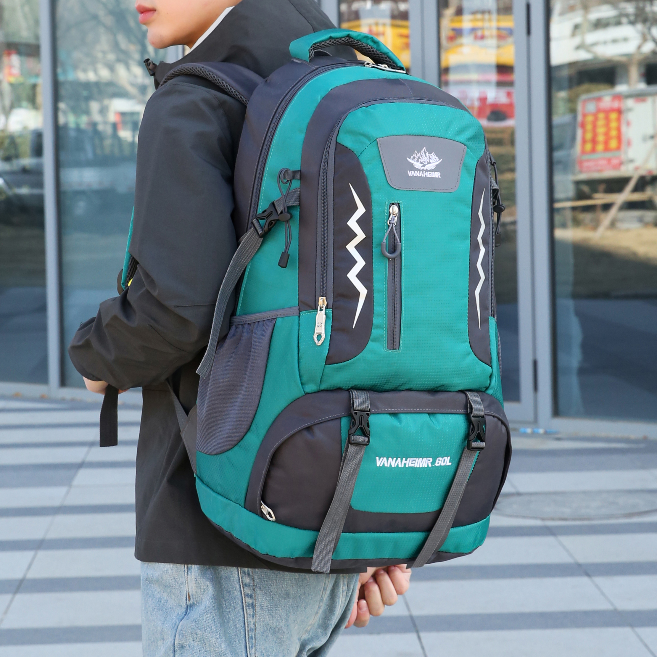 thumbnail video image 2 of 60L Waterproof Hiking Backpack with Reflective Strips & Safety Whistle, Large Capacity Multi-Pocket Nylon Rucksack for Camping Travel (Green), 2 of 10