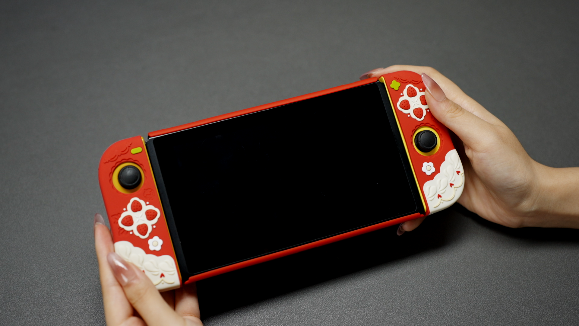 thumbnail video image 2 of GeekShare Protective Case for Nintendo Switch Console + Joycon Cover + Thumb Grips Spring Strawberry, 2 of 9