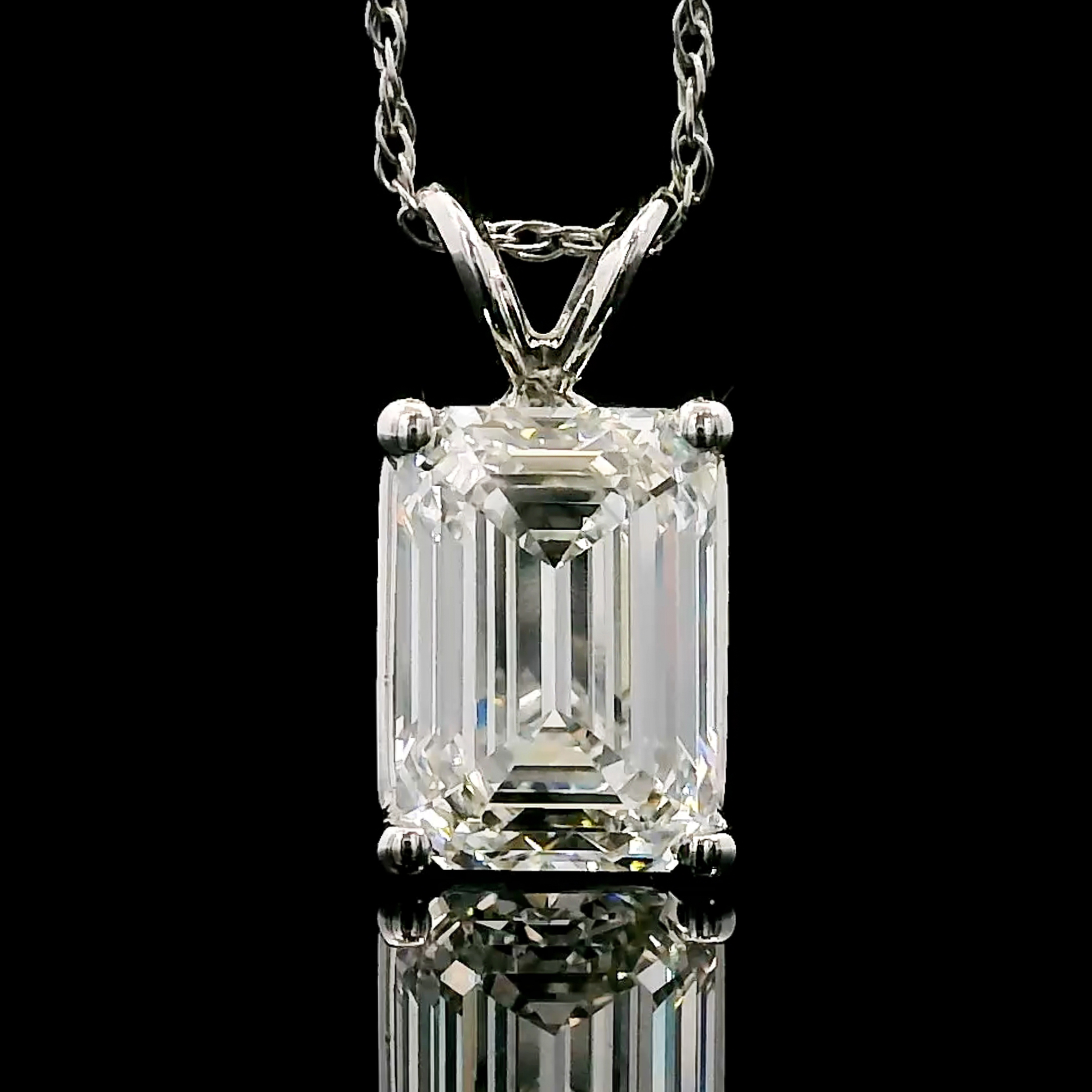 thumbnail video image 2 of Gem Stone King 1.50 Cttw IGI Certified Lab Grown Diamond in 14K Yellow Gold Pendant for Women | Emerald Cut | E-F Color | VS1-VS2 Clarity | Gold Necklace for Women | 18 inch Chain, 2 of 7