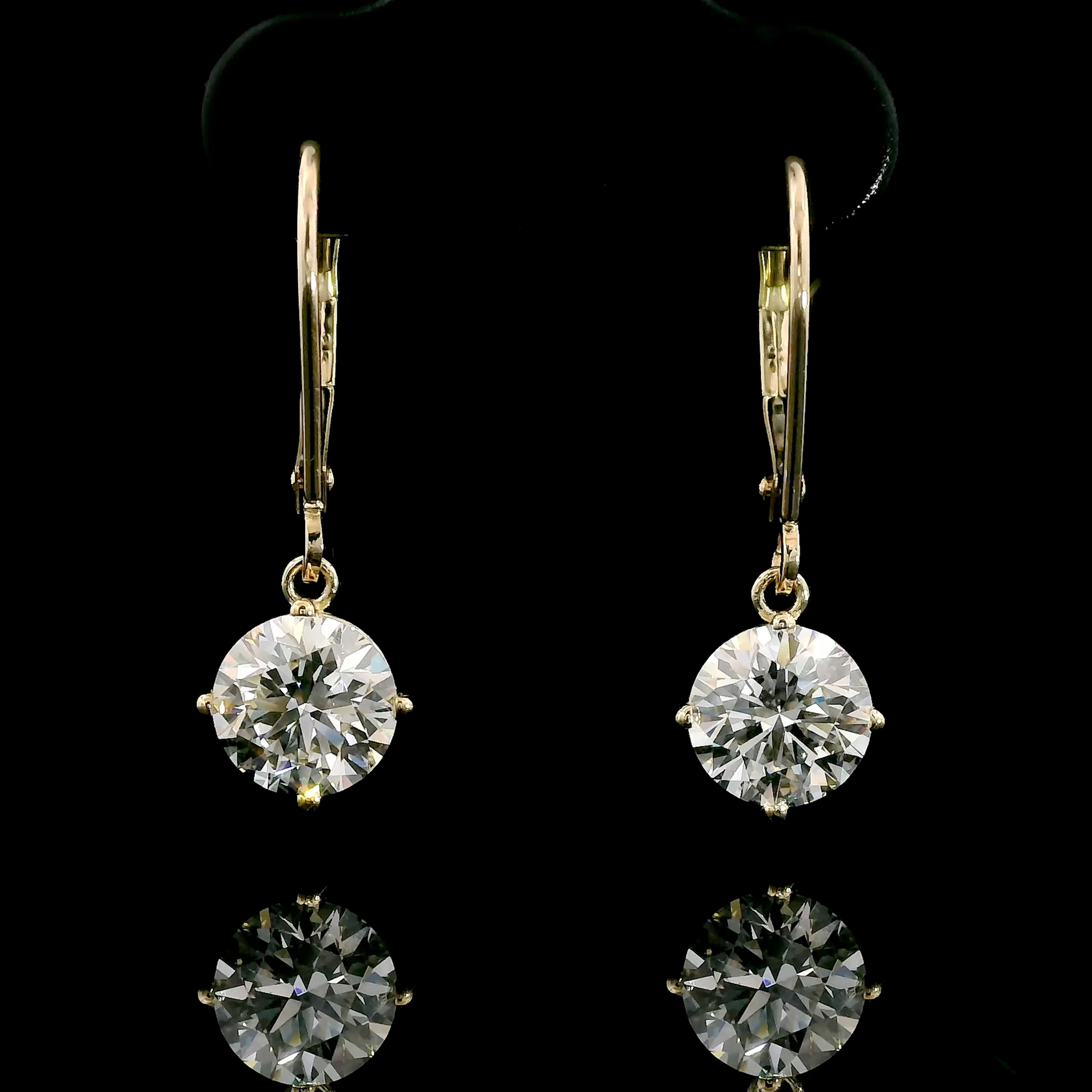 thumbnail video image 2 of Gem Stone King 14K Yellow Gold White Moissanite Earrings for Women | 2.00 Cttw | Gemstone Birthstone | Round 6.5MM, 2 of 8