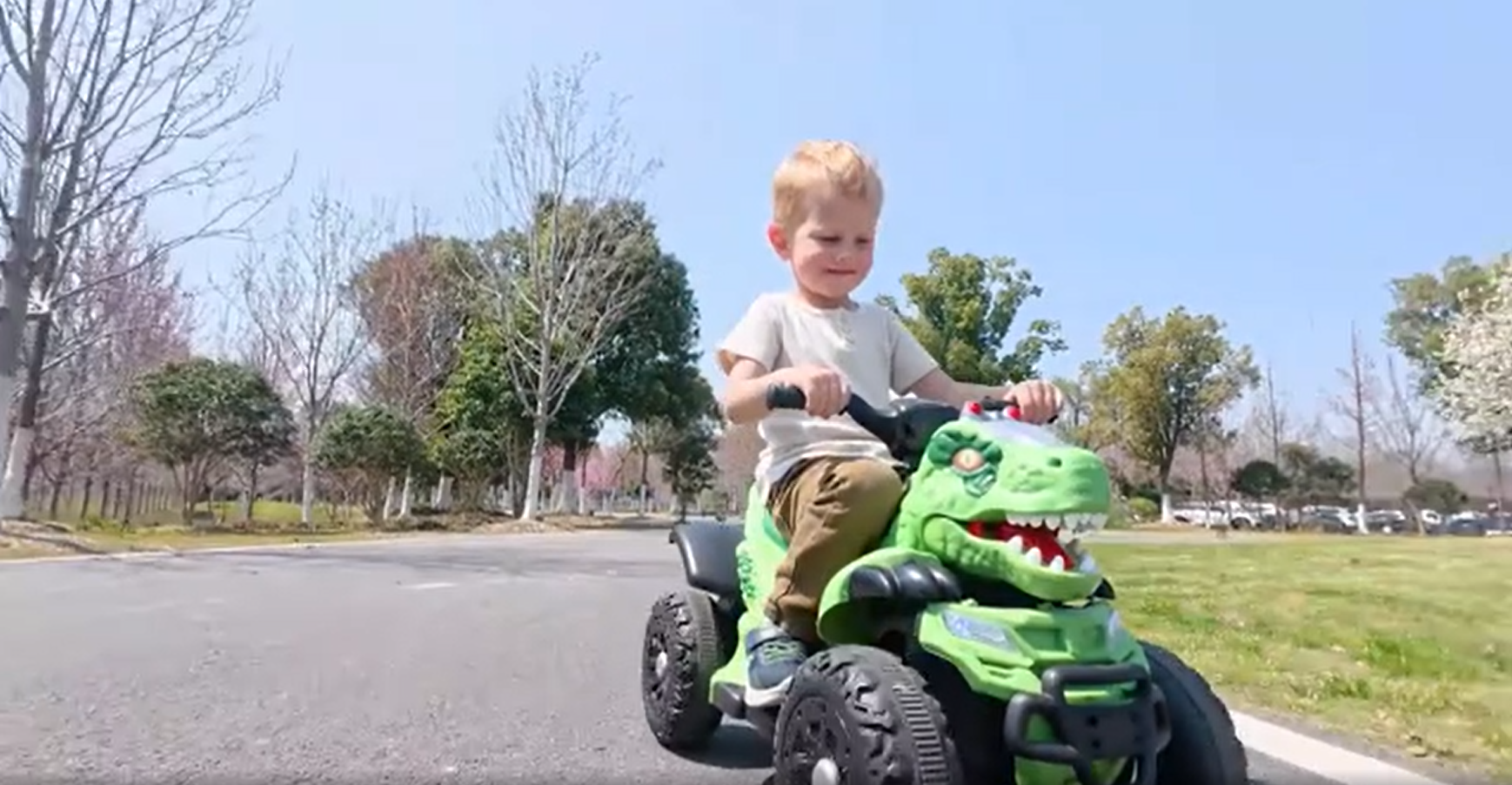 thumbnail video image 2 of Track Seven 12V Ride-On ATV, Dinosaur Shape Electric Car, 2WD, Music, Bluetooth & Microphone, Power Display, Indoor& Outdoor Ride-On Toy Car for Boys Girls Age 2+, Blue, 2 of 7