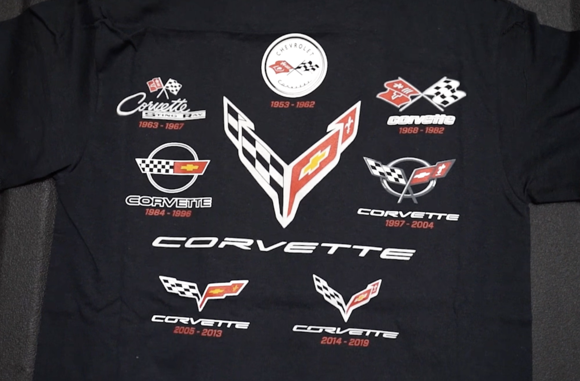 thumbnail video image 2 of JH Design Mens Chevy Corvette T-Shirt C1 Thru C8 Flag Emblems Collage, 2 of 6